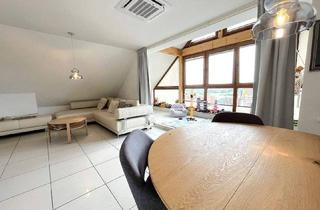 Wohnung kaufen in 90542 Eckental, Eckental - Moderne Dachgeschosswohnung mit großem Garten