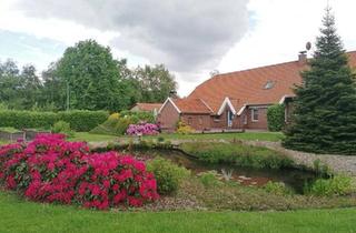 Haus kaufen in 26676 Barßel, Barßel - Ferienhaus in idyllischer Kanallage mit 6200m2 Fläche