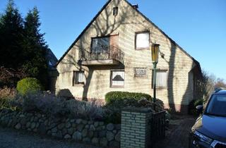 Einfamilienhaus kaufen in 25436 Uetersen, Uetersen - Zweifamilienhaus mit großem Garten und Vollkeller