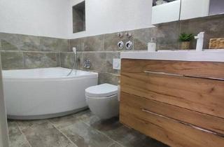 Wohnung kaufen in 35418 Buseck, Buseck - Komplett modernisierte Wohnung mit eigenem Stellplatz