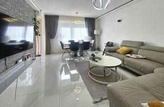 Wohnung kaufen in 50354 Hürth, Hürth - Modernisierte 3-Zimmer-Erdgeschosswohnung mit sonniger Süd-Loggia in Hürth-Kendenich