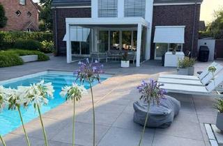 Einfamilienhaus kaufen in Laustiege 4, 48161 Münster, Münster - Außergewöhnliches Einfamilienhaus auf Erbpachtgrundstück mit Pool und Saunahaus in Münster-Gievenbeck