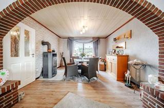 Einfamilienhaus kaufen in 26725 Widdelswehr/Jarßum, Charmantes Einfamilienhaus mit Garten, Terrasse und Doppelgarage in ruhiger Lage von Emden-Jarßum