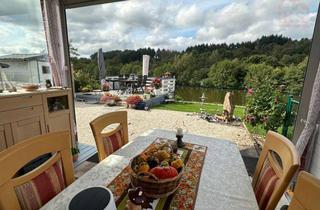 Haus kaufen in 66709 Weiskirchen, Wo der Blick zur Ruhe kommt – Ihr Zuhause direkt am Schwarzrindersee mit Seezugang