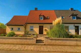 Doppelhaushälfte kaufen in 39288 Burg, Naturnah wohnen in ruhiger Lage – charmante Doppelhaushälfte mit großem Garten und viel Potenzial