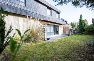 Wohnung kaufen in 55286 Wörrstadt, Wohnen wie im Haus: Gartenwohnung mit Kamin, Terrasse, großem Keller & Garage! Jetzt verlieben!