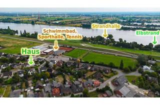 Haus kaufen in 21217 Seevetal, Zweifamilienhaus in Seevetal-Over nahe Hamburg Harburg, mit 2 Wohneinheiten, Balkon und Garten