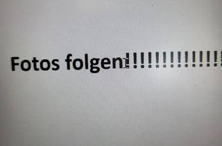 Haus kaufen in 26624 Südbrookmerland, Südbrookmerland - Neuwertges Doppelhaus in Moordorf zu verkaufen