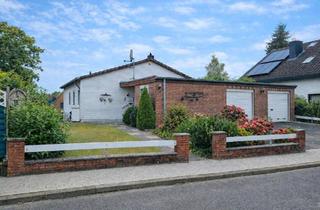 Einfamilienhaus kaufen in 23617 Stockelsdorf, Stockelsdorf - Bungalow mit Südgarten und zusätzlich großzügigem Souterrain