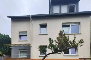 Haus kaufen in 64823 Groß-Umstadt, Groß-Umstadt - Vermietetes Zweifamilienhaus in Groß-Umstadt