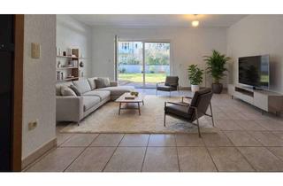 Wohnung kaufen in 45145 Frohnhausen, Gepflegte 2,5-Zimmer-Wohnung mit eigenem Garten und TG-Stellplatz