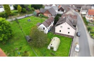 Mehrfamilienhaus kaufen in 63683 Ortenberg, Attraktives Mehrfamilienhaus mit Nebenhaus und großem Baugrundstück in Ortenberg Bergheim