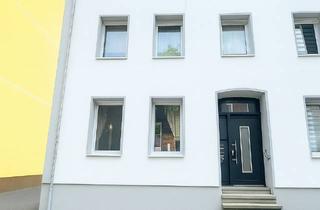 Wohnung kaufen in 44866 Günnigfeld, Exklusives Wohnvergnügen im Grünen: Erdgeschosswohnung mit Gemeinschaftsgarten & 2 Badezimmern!