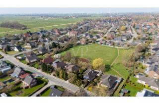 Haus kaufen in 26759 Hinte, Großzügiger Bungalow mit ausgebautem Dachgeschoss