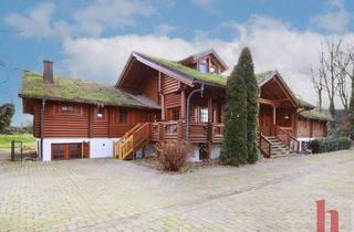 Haus kaufen in 49439 Steinfeld, Steinfeld - Charaktervolles Holzhaus mit Wohnung und großzügigem Nebengebäude in besonderer Lage