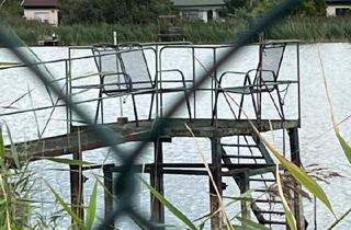 Haus kaufen in 06386 Osternienburger Land, Osternienburger Land - Bungalow direkt am Löbitzsee mit Steg zum Wasser
