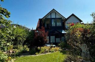 Haus kaufen in 37671 Höxter, Höxter - Traumhaus mit zwei Wintergärten, Kamin und idyllischem Garten