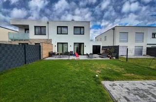 Doppelhaushälfte kaufen in 50181 Bedburg, Bedburg - Architektur, Design und Wohnqualität auf höchstem Niveau