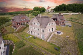 Wohnung kaufen in Schlossallee 21-36, 18551 Lohme, Exklusive Dachgeschosswohnung unter Reet – mit Loggia & Sauna auf Rügen