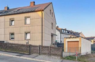 Doppelhaushälfte kaufen in 95233 Helmbrechts, Attraktive Wohnimmobilie als Renditeobjekt – Vermietete Doppelhaushälfte in Helmbrechts