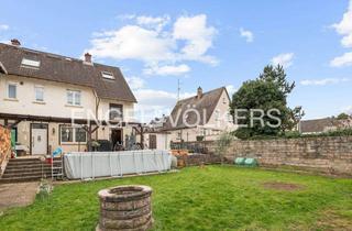 Haus kaufen in 65462 Ginsheim-Gustavsburg, Gepflegtes Dreifamilienhaus – Eigennutzung oder Kapitalanlage mit 5,2 % Rendite
