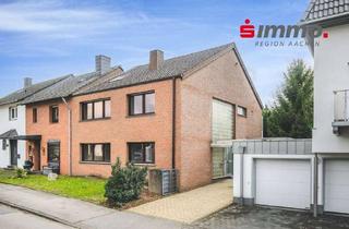 Haus kaufen in 52146 Würselen, Bezugsfreies Zweifamilienhaus mit Garage und Süd-Garten