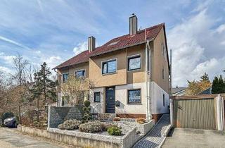 Doppelhaushälfte kaufen in 91233 Neunkirchen, Gepflegte Doppelhaushälfte mit Wintergarten & modernem Garten – Ihr neues Zuhause in Neunkirchen