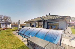 Haus kaufen in 35619 Braunfels, Barrierearmer Bungalow mit 7 Zimmern, KNX-System, Pool und hochwertigster Ausstattung