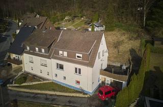 Haus kaufen in 59872 Meschede, Modernisieren & profitieren: Zweifamilienhaus mit Entwicklungspotenzial