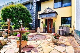 Reihenhaus kaufen in 44799 Querenburg, Frühlingserwachen in Steinkuhl - liebevoll modernisierte Reihenhausvilla mit mediterranem Flair