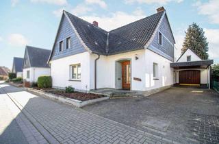 Einfamilienhaus kaufen in 33378 Rheda-Wiedenbrück, Gepflegets Einfamilienhaus mit Garten und Garage in guter Lage von Rheda