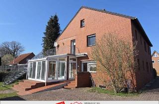 Haus kaufen in 31626 Haßbergen, Solides 2-Familienhaus mit Garten, Doppelgarage und vielseitigen Nutzungsmöglichkeiten