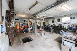 Einfamilienhaus kaufen in 56235 Ransbach-Baumbach, Handwerkertraum mit Grube! Einfamilienhaus inkl. Werkstatt und Ausbaupotenzial in Ransbach-Baumbach