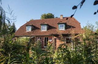 Einfamilienhaus kaufen in 28879 Grasberg, Einfamilienhaus mit Einliegerwohnung in idyllischer Lage