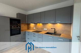 Wohnung kaufen in 26802 Moormerland, Neubau Erdgeschosswohnung mit Terrasse und Garten