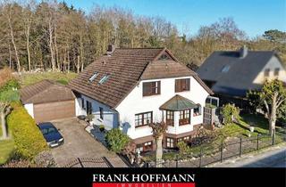 Einfamilienhaus kaufen in 25451 Quickborn, Attraktives Einfamilienhaus mit großzügiger Wohnfläche in begehrter Waldrandlage in Quickborn