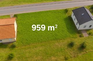 Immobilie kaufen in 74731 Walldürn, erschlossenes Hanggrundstück mit Weitblick – 959 m² + Wohnraumförderung