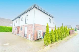Wohnung kaufen in 46499 Hamminkeln, Exklusives Wohnen: Neuwertige 2,5-Zimmer-Wohnung mit Dachterrasse in idyllischer Lage
