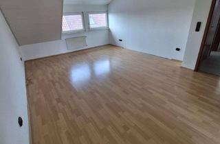 Wohnung kaufen in 64546 Mörfelden-Walldorf, Helle 2 Zimmer DG Wohnung mit PKW Stellplatz