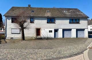 Haus kaufen in 57586 Weitefeld, Wohnhaus mit freistehender Garage im Ortskern von Weitefeld