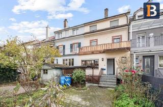 Haus kaufen in 79539 Lörrach, Ihr neues Zuhause: Renovierungs-bedürftiges RMH mit Garten in zentraler Lage!