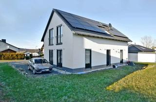 Einfamilienhaus kaufen in 34582 Borken, Modernes Einfamilienhaus in Borken OT Arnsbach mit Wärmepumpe und PV-Anlage