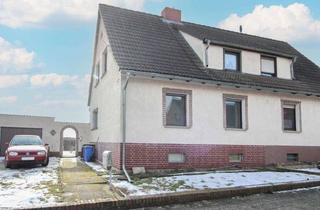 Doppelhaushälfte kaufen in 39317 Parey, Doppelhaushälfte in Derben mit Gestaltungsspielraum und Renovierungsbedarf