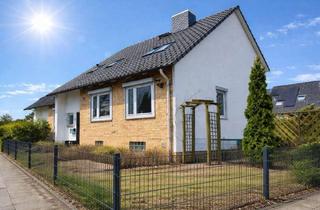 Reihenhaus kaufen in 25469 Halstenbek, Gepflegtes Endreihenhaus mit Südgarten und Garage in ruhiger Lage von Halstenbek