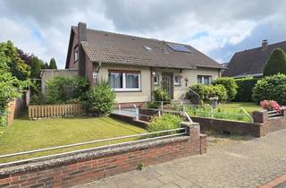 Haus kaufen in 29633 Munster, Gepflegtes Zweifamilienhaus mit Tiefgarage und Sauna in ruhiger Lage von Munster-Breloh