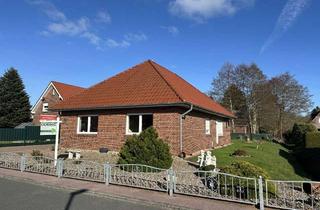 Haus kaufen in 26842 Ostrhauderfehn, Attraktiver Bungalow mit Garage, Terrasse und Ausbaupotenzial in begehrter Lage
