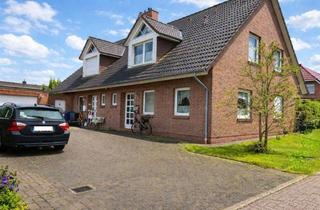 Haus kaufen in 26655 Westerstede, 2 vermietete DHH mit Garagen in ruhiger Wohnlage!