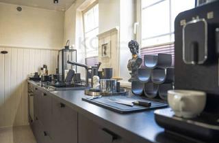 Wohnung kaufen in 34225 Baunatal, Historisches Denkmalobjekt: Exklusive Eigentumswohnung mit Bürooption