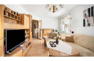 Wohnung kaufen in 09599 Freiberg, Gepflegte 3-Zimmer-Wohnung mit Balkon, Stellplatz und eigenem Gartenanteil