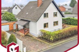 Einfamilienhaus kaufen in 53359 Rheinbach, Freistehendes Einfamilienhaus mit großem Grundstück, Garage und viel Potenzial in Wormersdorf